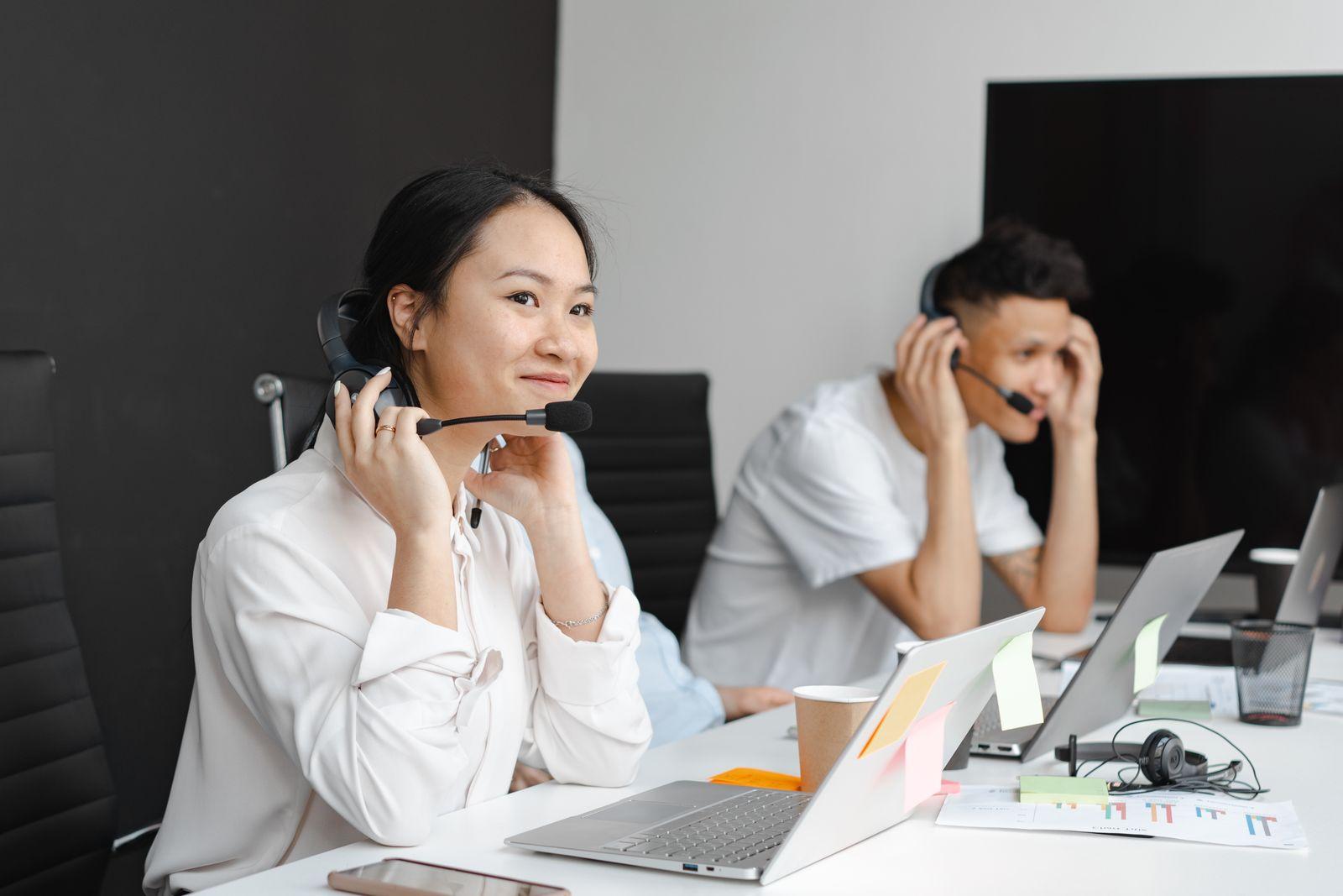 Team of professional interpreters with headsets handling live calls